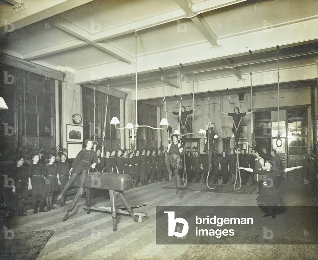 Montem Street Evening School: women exercise in the gymnasium, 1913 (b/w photo)
