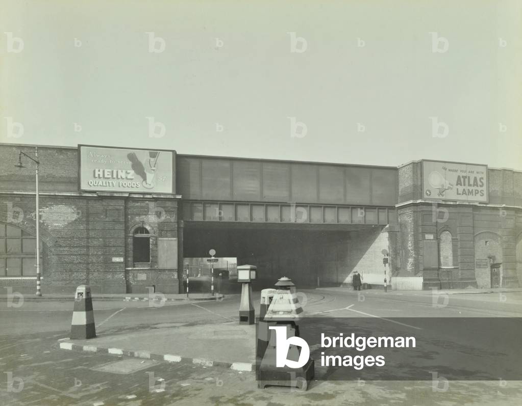 View of Vauxhall Bridge with commercial advertisements, including Heinz, 1944 (b/w photo)