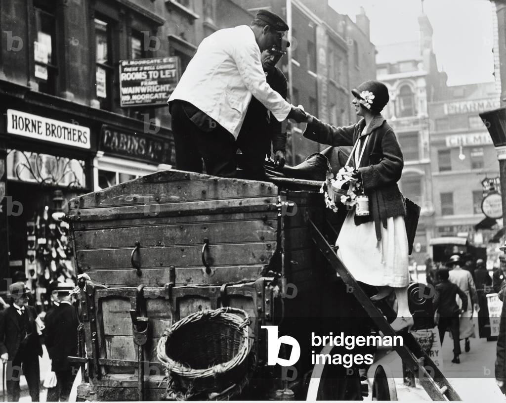 Dustmen receiving flowers on Alexandra Rose Day, London, 1924 (b/w photo)