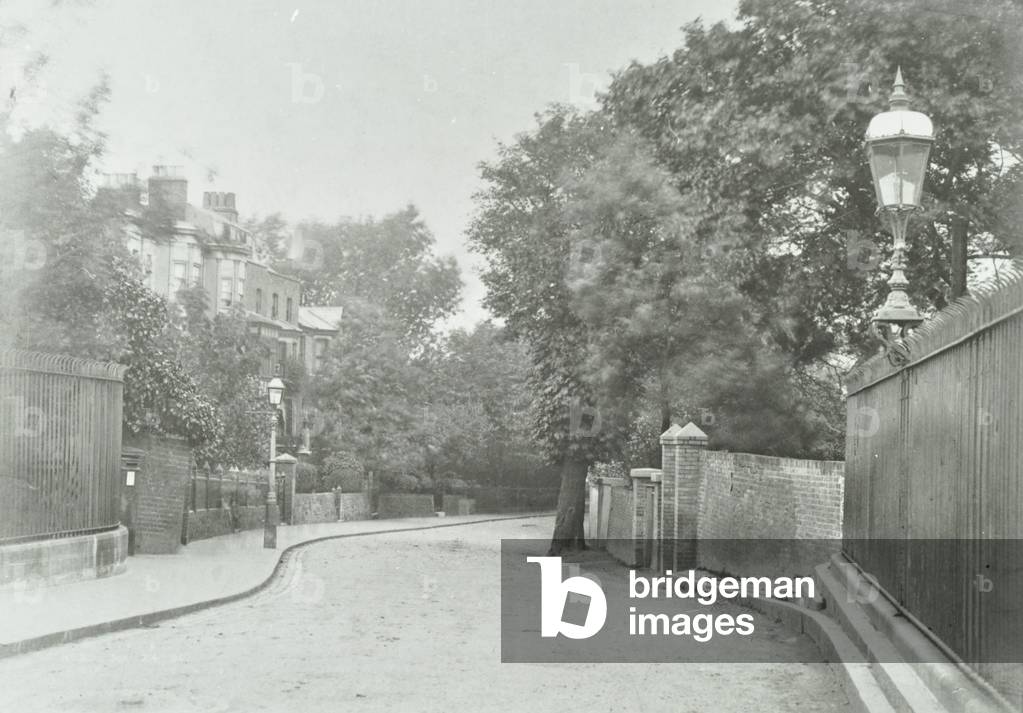 Highgate Archway: eastern approach with old lamp fixed to railings, 1896 (b/w photo)