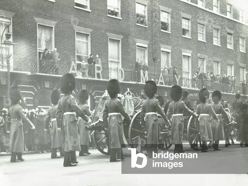 Funeral procession of King George V making its way along Bernard Street, Bloomsbury, with the Coldstream Guards flanking the gun-carriage, London, 1936 (b/w photo)