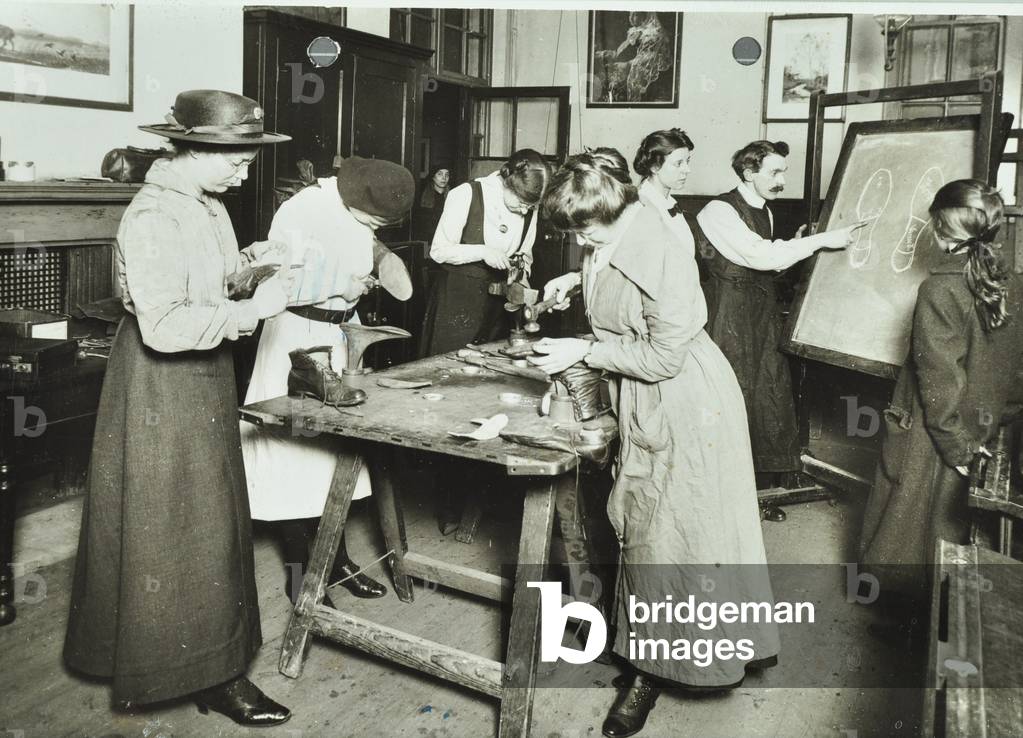 Battersea Women's Institute: women learn the craft of shoe repair, 1914 (b/w photo)