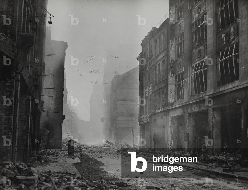 View of Houndsditch looking towards Aldgate showing bomb damage, 1941 (b/w photo)