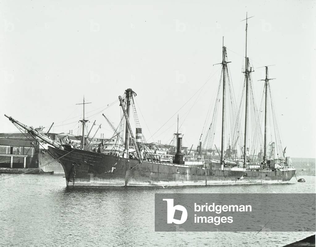 West India Dock scene featuring a large, unidentified three-masted vessel, London, 1930 (b/w photo)