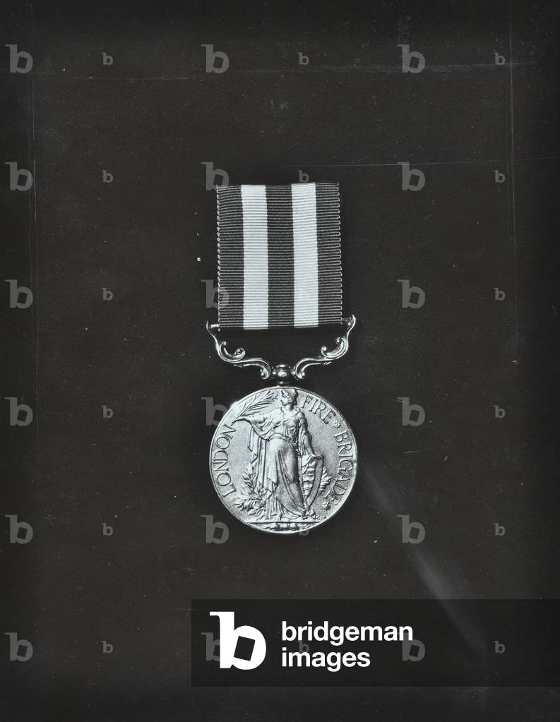 London Fire Brigade a medal, awarded for bravery, 1935 (b/w photo)