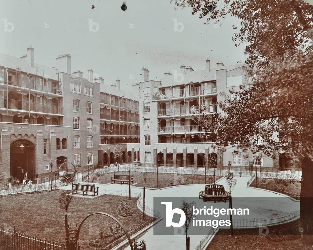 Caledonian Road Buildings: view of courtyard, gardens and flats, London, 1907 (b/w photo)
