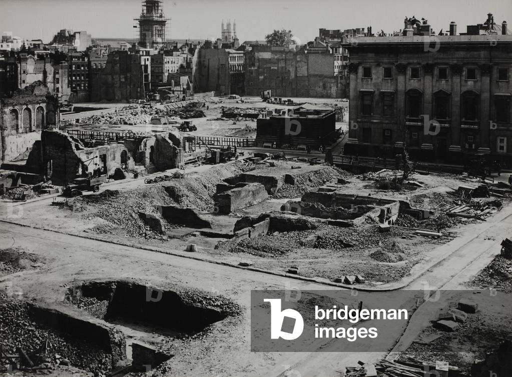 Bomb damage following the demolition of unsafe buildings, England, 1942 (b/w photo)