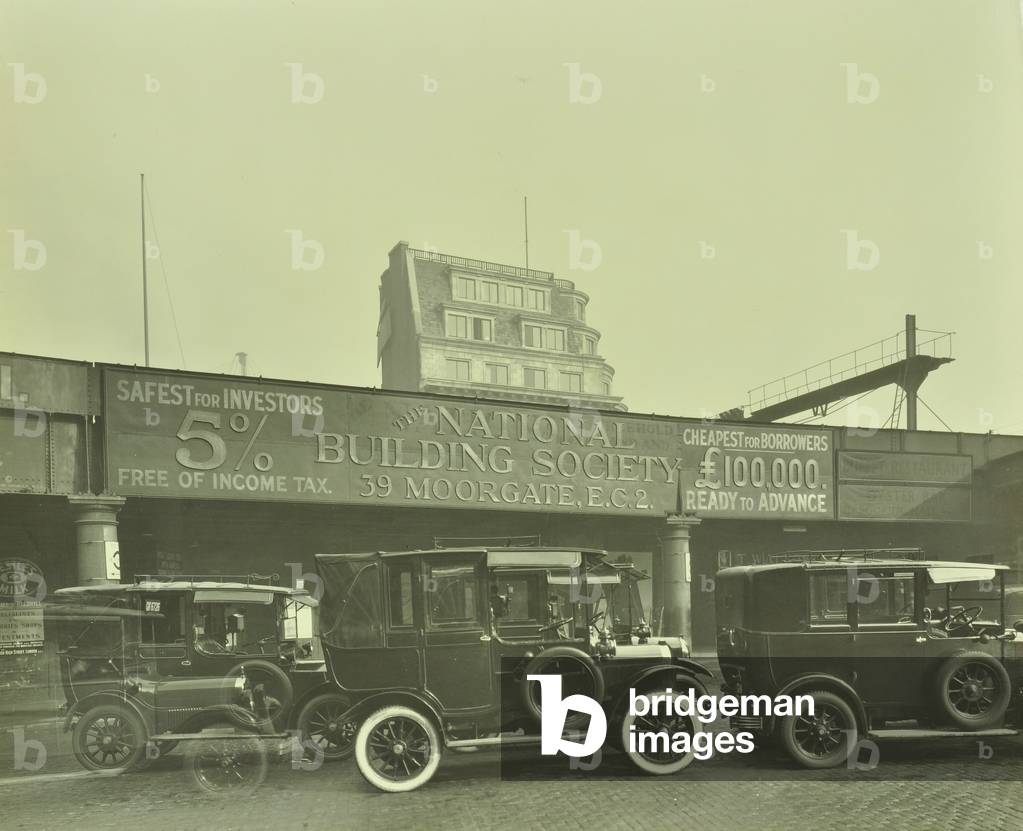 Advertisement for 'National Building Society' at London Bridge railway station, 1931 (b/w photo)