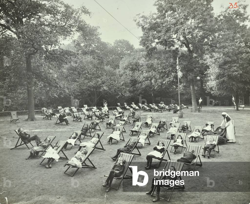 Bostall Woods Open Air School: children resting in the grounds, 1907 (b/w photo)
