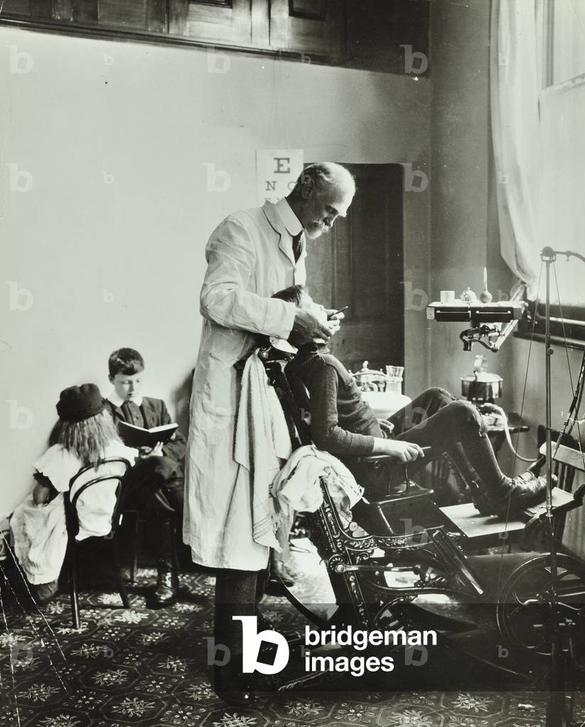 Deptford Children's Centre: dental surgeon at work, 1911 (b/w photo)