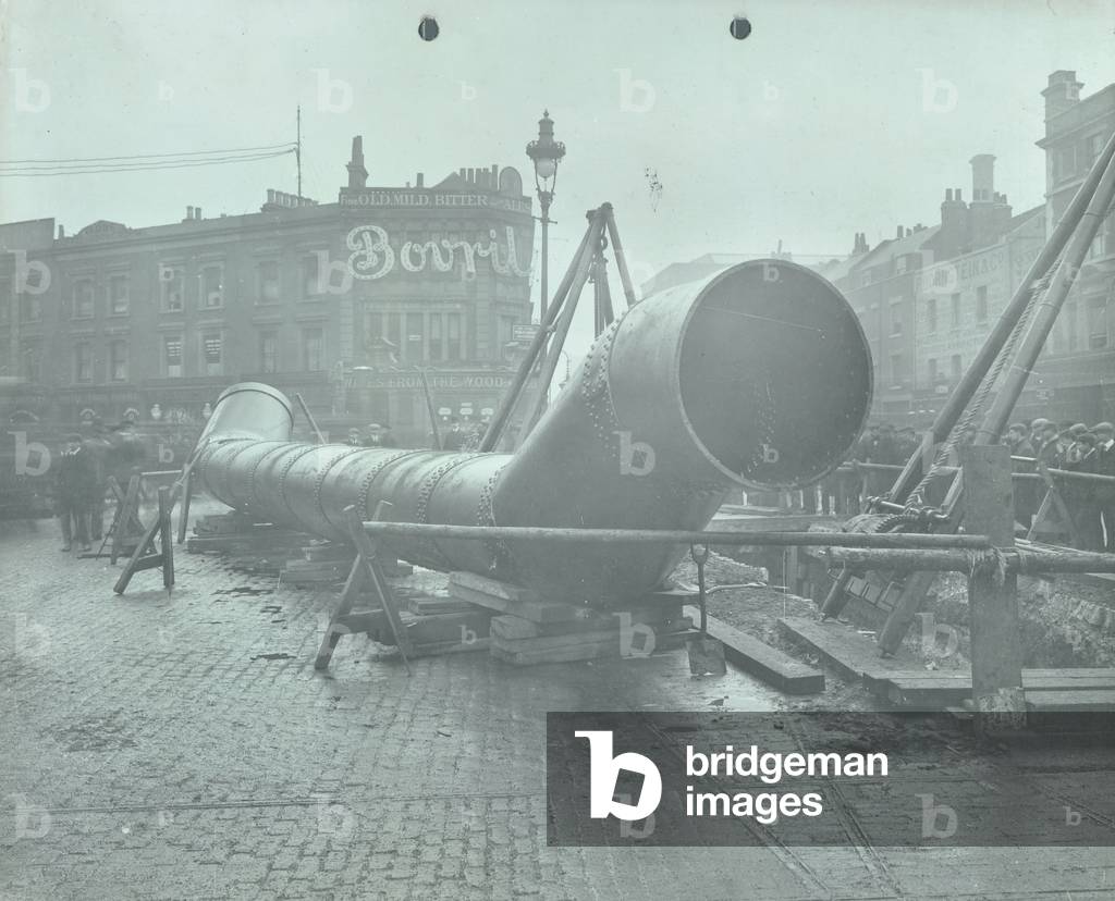 Construction of an electrified tramway at the junction between Commercial Road and Whitechapel High Street, 1906 (b/w photo)