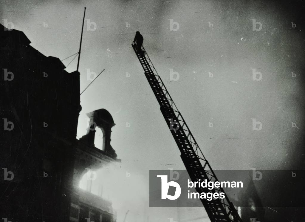 Eastcheap: fire being extinguished, 1941 (b/w photo)