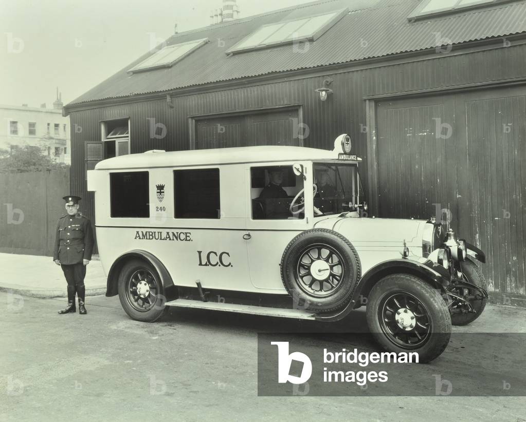 Brixton Amubulance Station: view of an ambulance and the driver, 1930 (b/w photo)