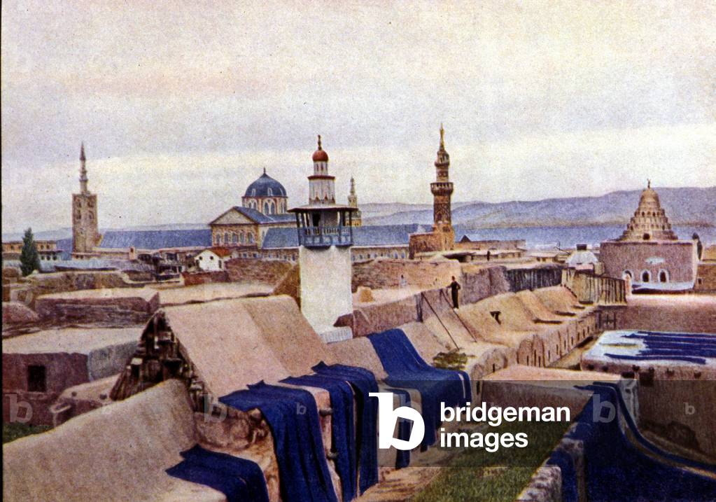 Blue cotton fabrics put to dry on the roofs of dyers in Damascus (Syria).