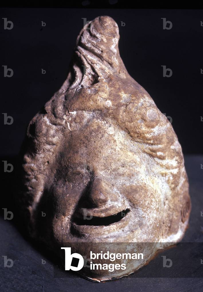 Greek theatre mask depicting an old woman. Terracotta. Greek Art, Southern Italy, 6th or 5th century BC