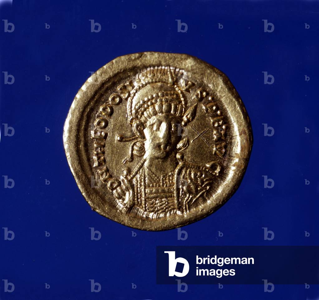 Gold coin with the effigy of the Byzantine Emperor Theodosius II (401 - 450).