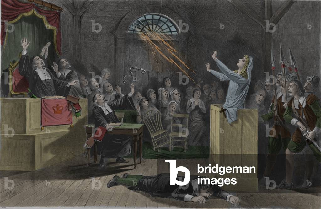 A lightning burns the chains of a witch during her trials in Salem.