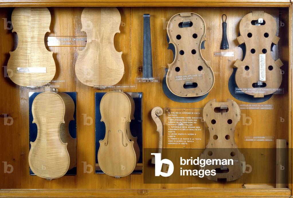 Stage of making a violin. 19th century.