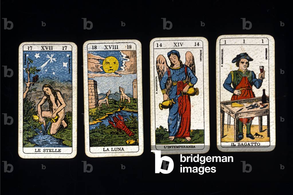 Tarot cards from the beginning of the 20th century representing the moon, the stars, the weather and the boatman.