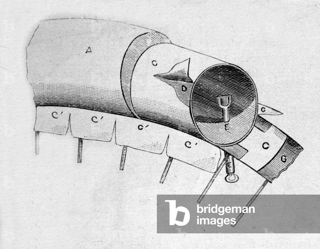 Cutting the pneumatic rubber of a bicycle invented by Englishman John Boyd Dunlop in 1888.