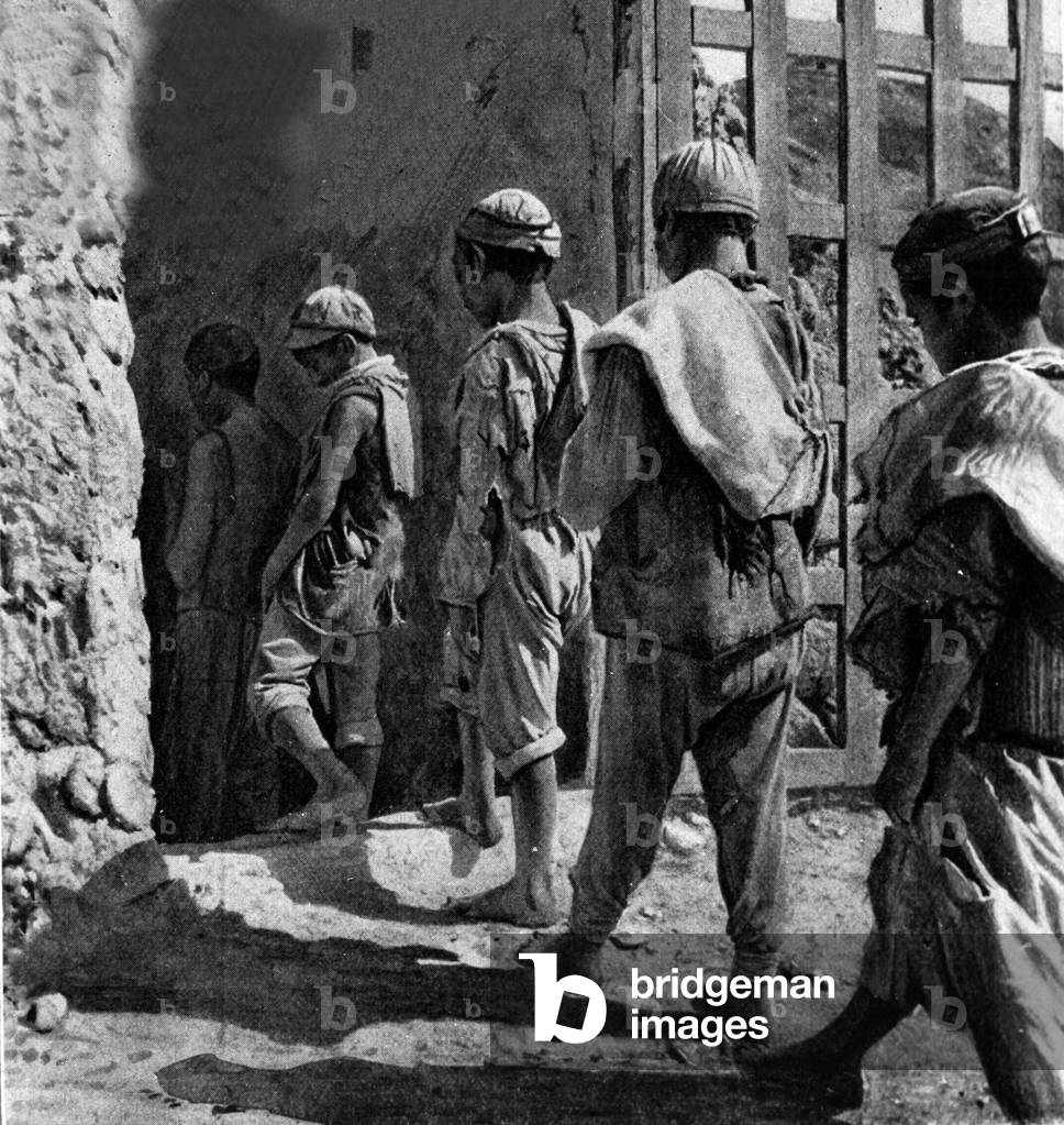 Child labour; carusi, miners, enter the mine.