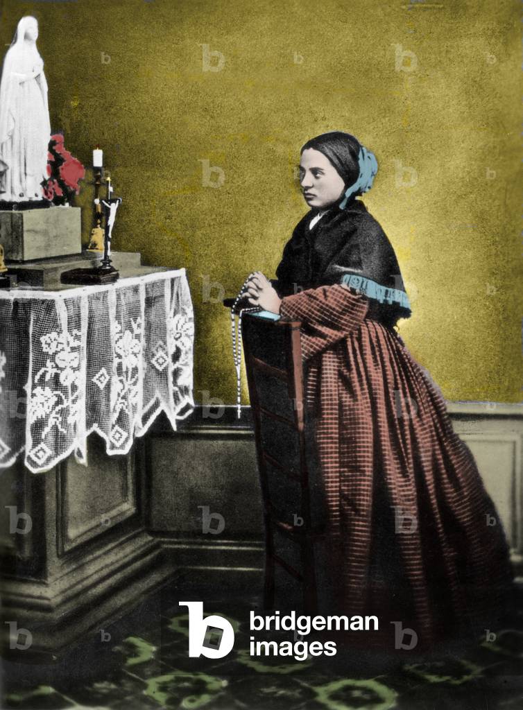 Bernadette Soubirous kneeling before an altar to the Virgin (1844-1879)