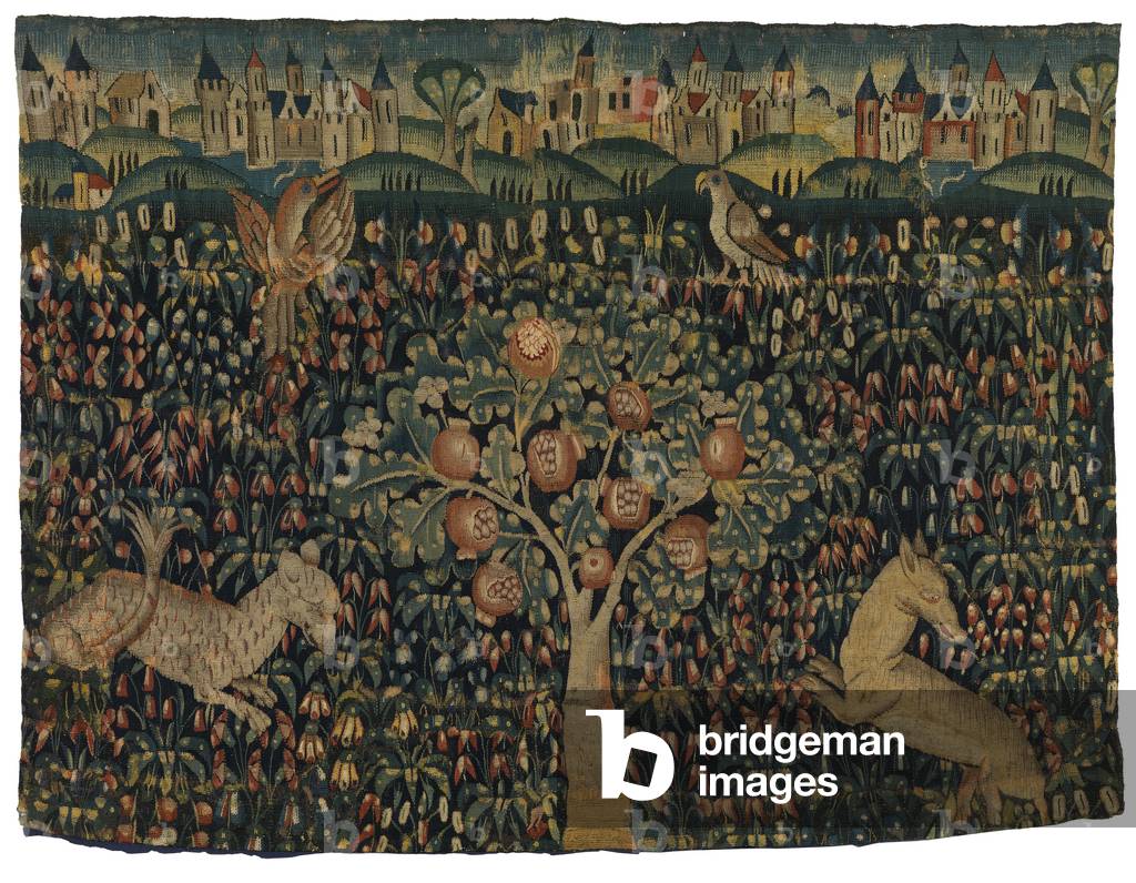Tapestry fragment of mille fleurs depicting animals and birds, with town in background, from Oudenarde, 1500-50 (wool)