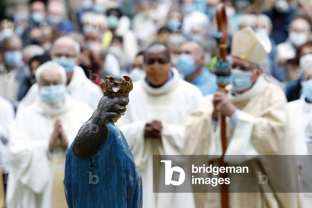 Catholic church during covid-19 epidemic. Celebration of the mass.  Sanctuary of La Benite Fontaine. France.
