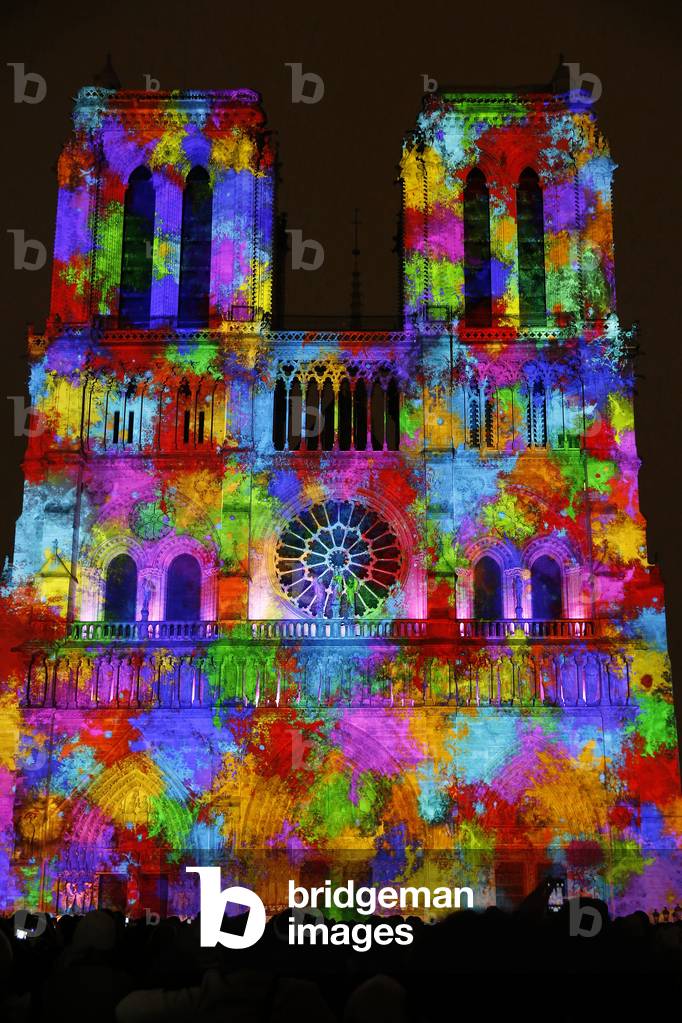 Sound and light show at Notre Dame de Paris cathedral, France (photo)