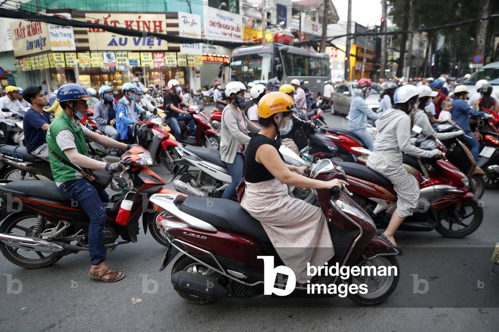 Motorbikes on chaotic street life traffic, Ho Chi Minh City, Vietnam (photo)