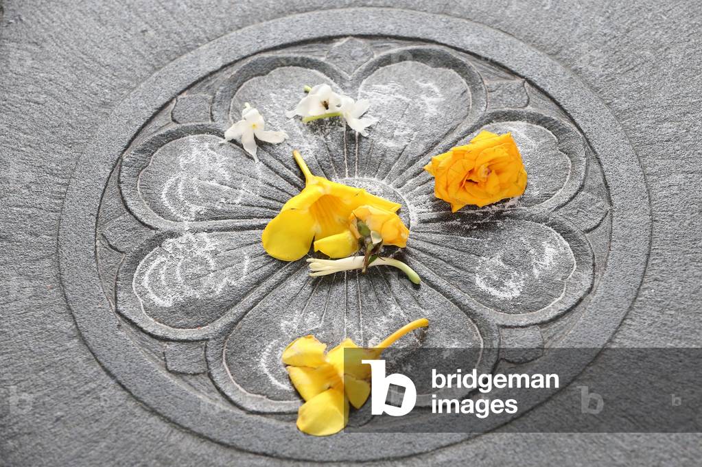 Hindu symbol and floral offerings. Singapore