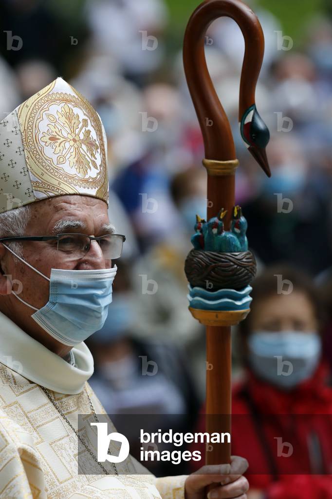 Catholic church during covid-19 epidemic.  Celebration of the mass.   Bishop.  Mgr Yves Boivineau.  Sanctuary of La Benite Fontaine. France.