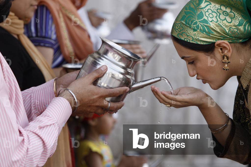 Water offered in Bangla Sahib Gurdwara, New Delhi, Delhi, India