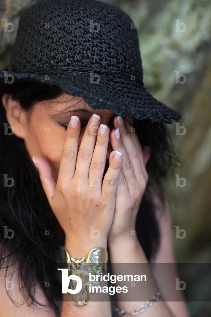 Woman hiding her face Servoz France