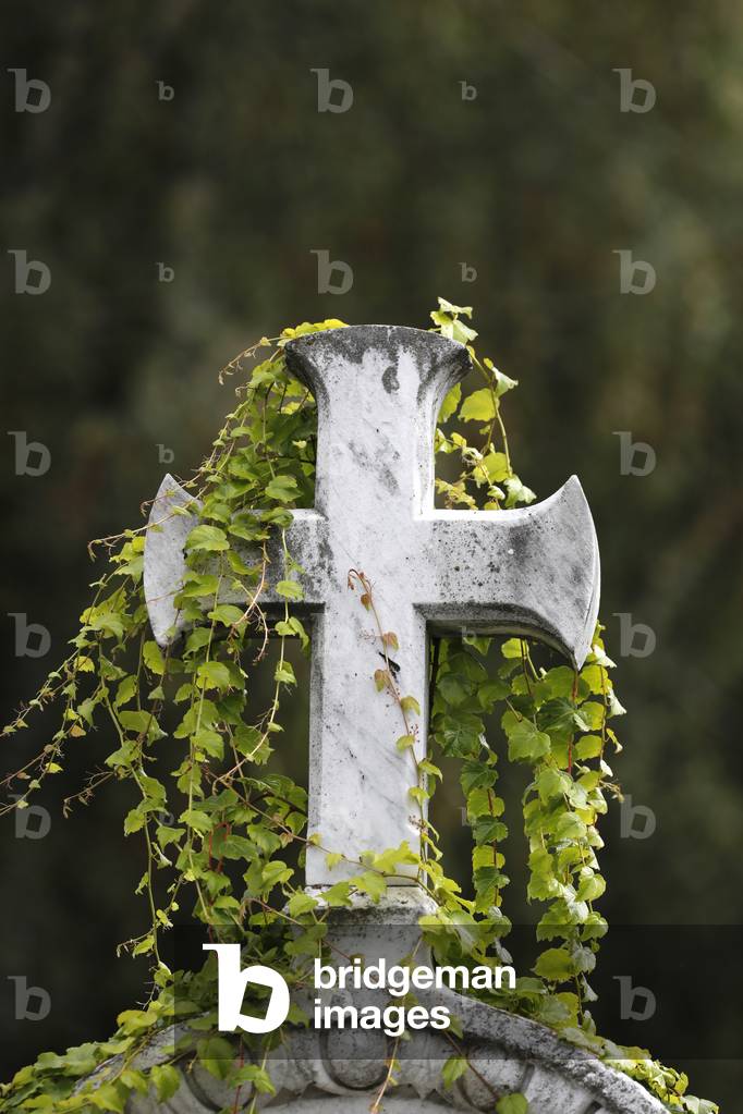 Grave in cemetery.  Stone cross.  Annecy. France.