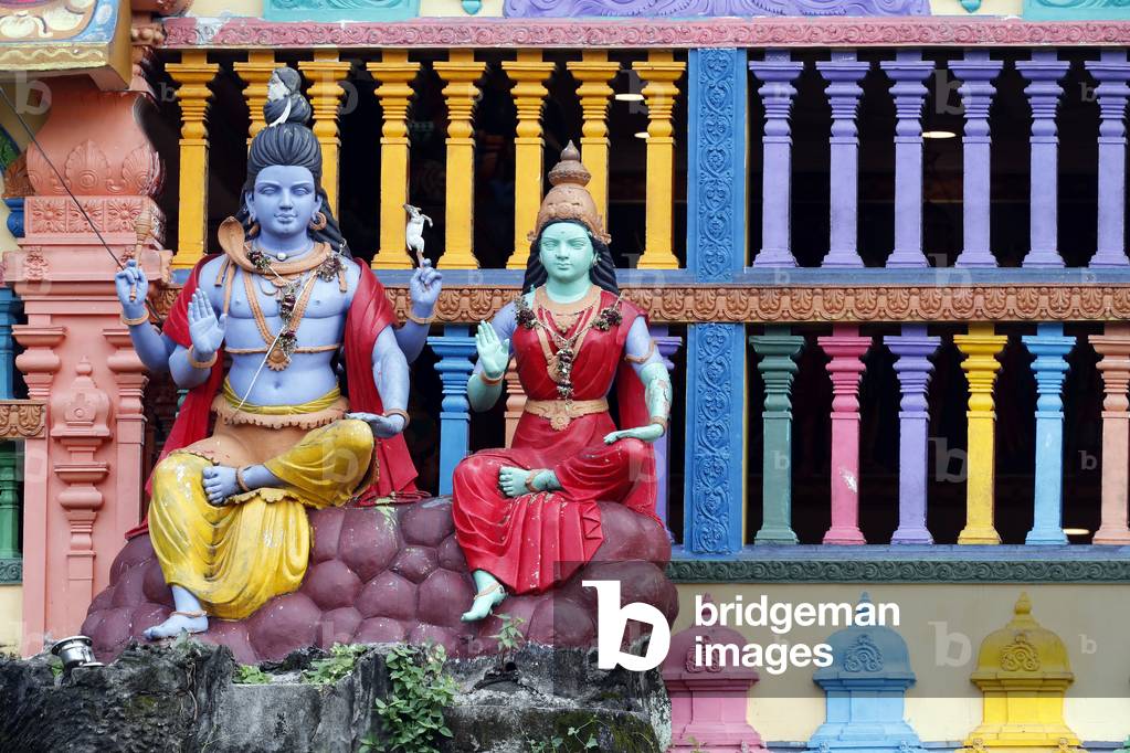 Hindu temple and shrine of Batu Caves, Hindu God Shiva with wife Paravati Mata, Kuala Lumpur, Malaysia (photo)