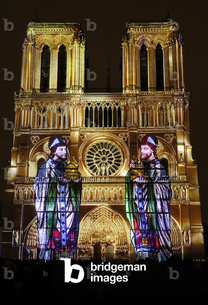 Sound and light show at Notre Dame de Paris cathedral, France (photo)