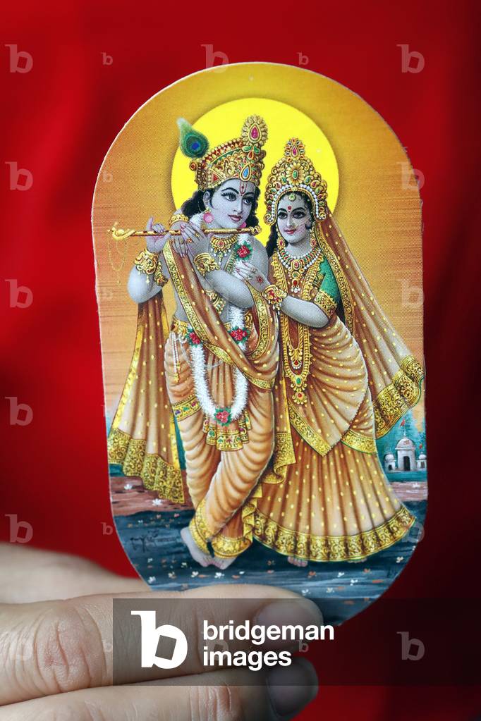 Krishna and Radha, Close-up, Hindu god image in hand, 2019 (photo)