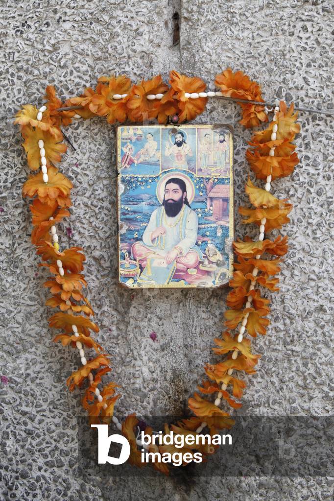 Garlanded guru image, Delhi, India