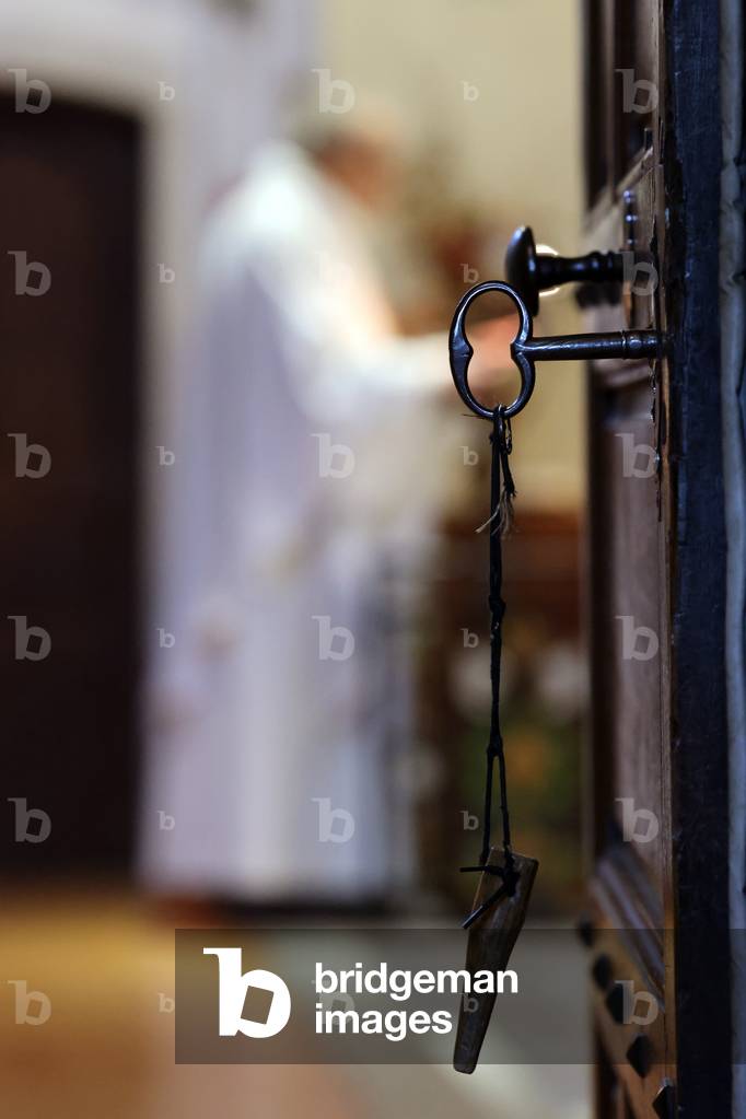 Catholic church. Sacristy. The door with key.  France.