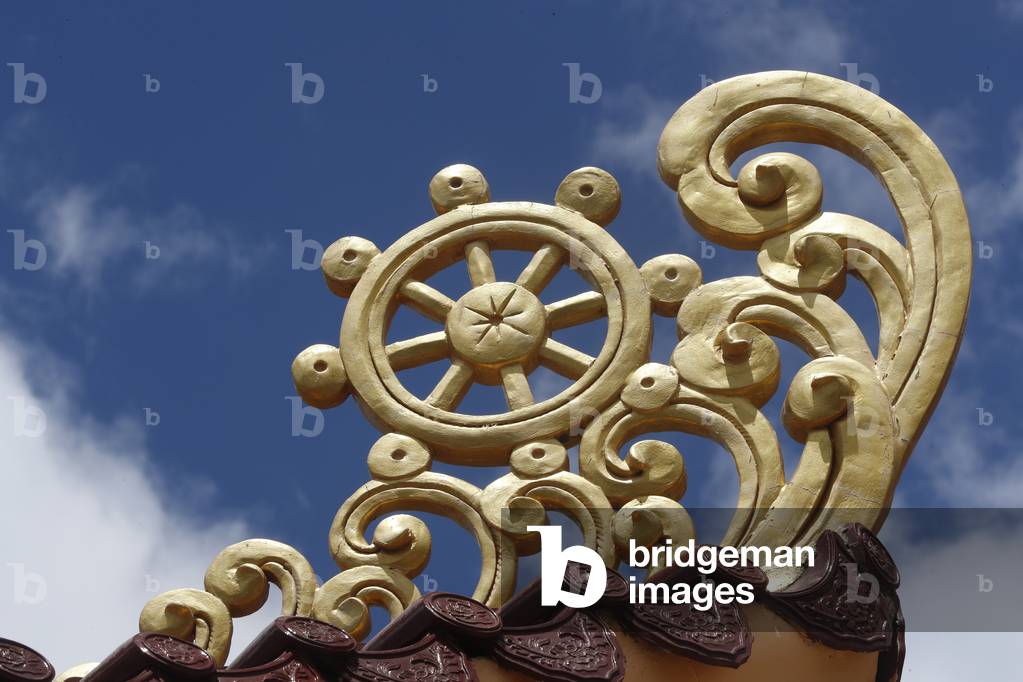 Tinh Xa Ngoc Tin  buddhist temple,  Dharma Wheel,  Dharmachakra, the Buddhist eight-fold path illustrated in a wheel, Dalat, Vietnam (photo)