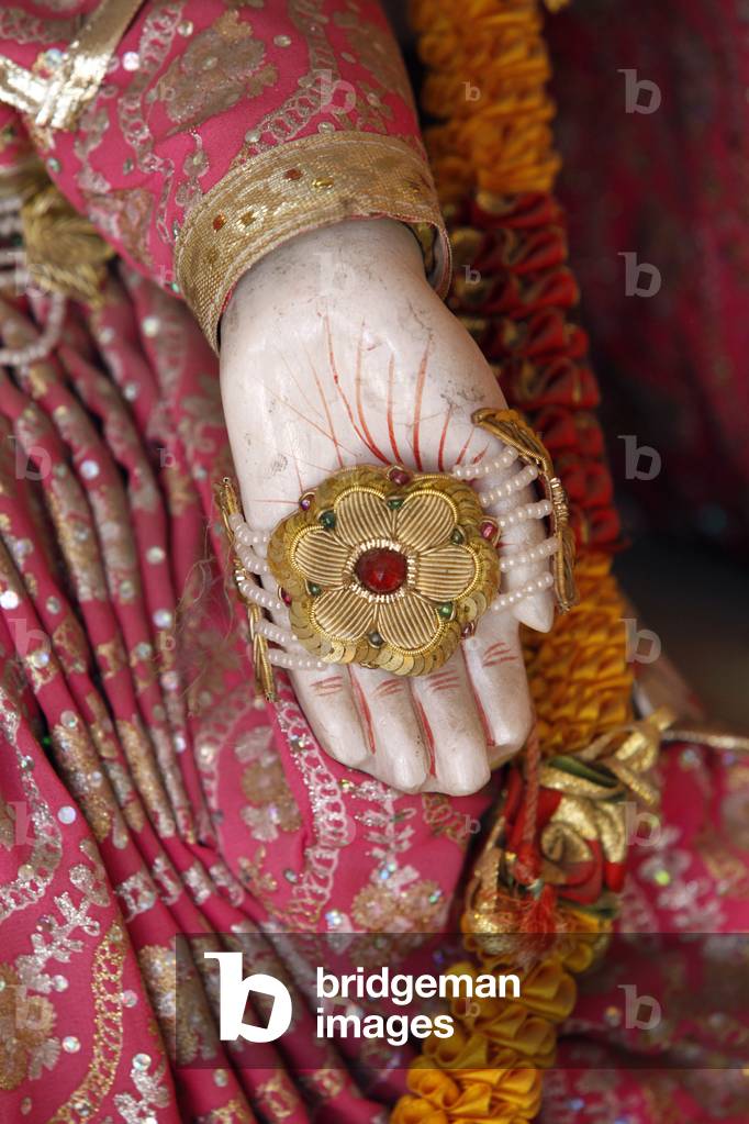 Detail of a statue in Lakshman temple, Rishikesh : Varada Hasta (giving hand) Rishikesh India