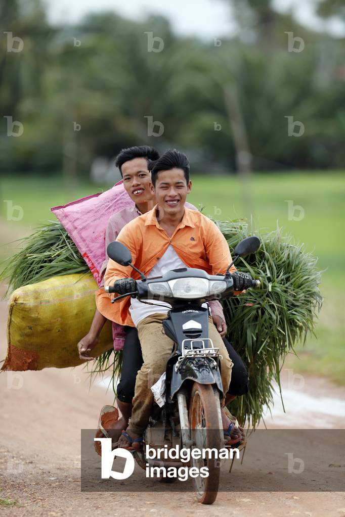 Farmers on motorbike, Kep, Cambodia, 2019 (photo)