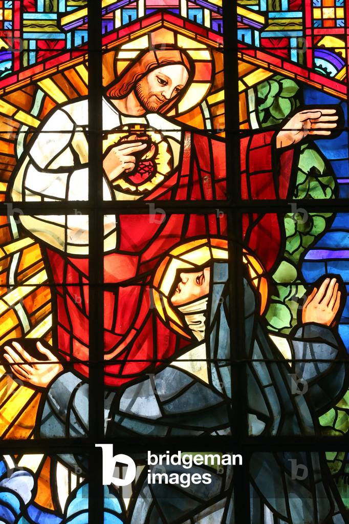 Dalat cathedral. Stained glass window. The apparitions of the Sacred Heart to Saint Margaret Mary Alacoque. Dalat. Vietnam
