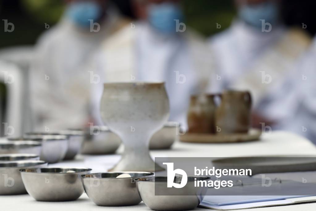 Catholic church during covid-19 epidemic. Sunday mass. Eucharistic table.  Sanctuary of La Benite Fontaine. France.