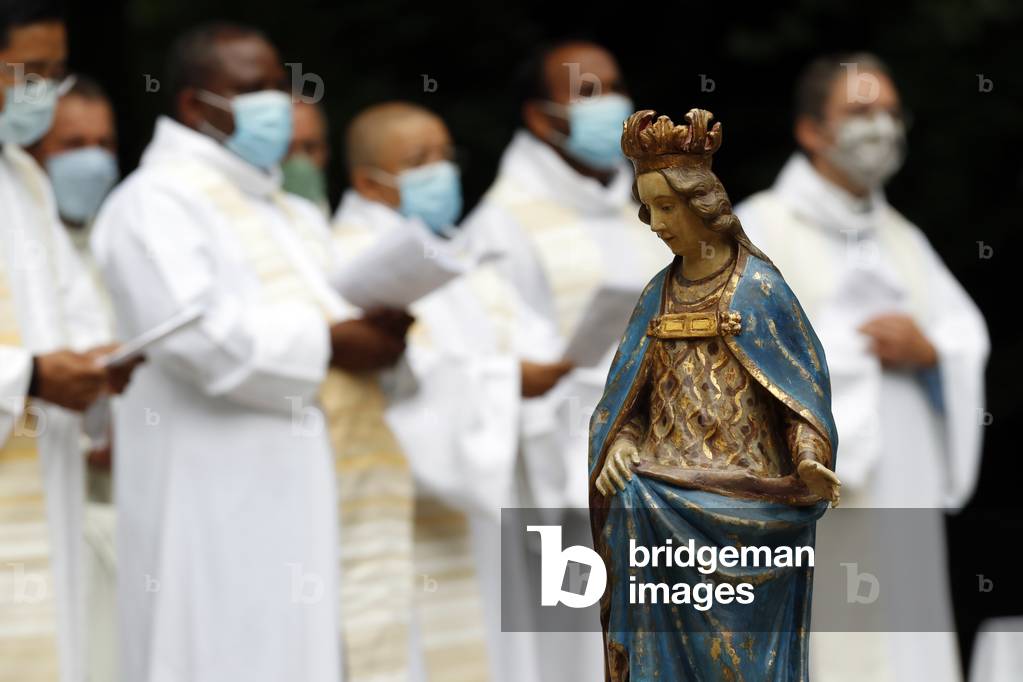 Catholic church during covid-19 epidemic. Celebration of the mass.  Sanctuary of La Benite Fontaine. France.