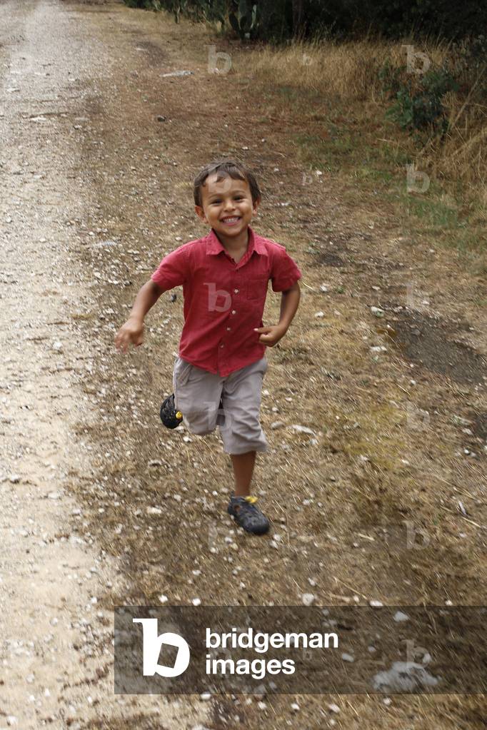 Boy running, Portoselvaggio, Italie