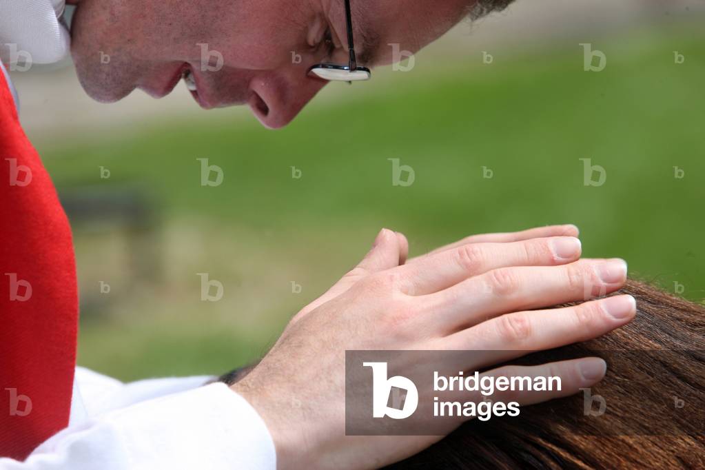 Priest's blessing Paris France
