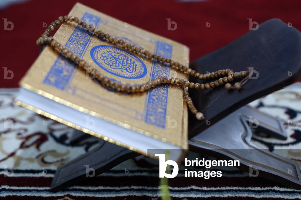 Jamiul Islamiyah Mosque. Holy Quran or Koran with prayer beads ( Tasbih ). Ho Chi Minh City. Vietnam