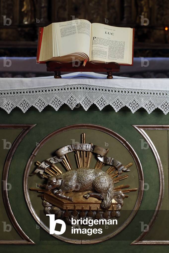 Notre Dame de l'Assomption de Cordon church.  Open bible.  New testament.  Luke the Evangelist, the author of the third gospel.  France.  France.